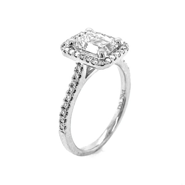 1.57 carats Emerald Cut Diamond Set in an 18 Karat white gold halo ENGAGEMENT RING.